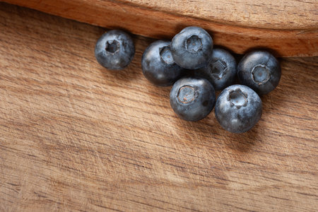 blueberries. Blueberry on a wooden background close-up. selective soft focusの写真素材