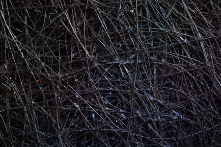 Abstract background. Tangled wire close-up. Macro image of a wire. Highly textured imageの写真素材