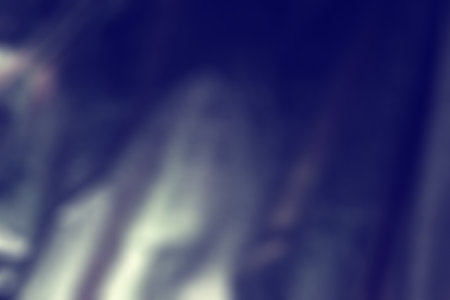 Abstract background. Glare surface. Light stains. Defocused glow. Blurred imageの写真素材