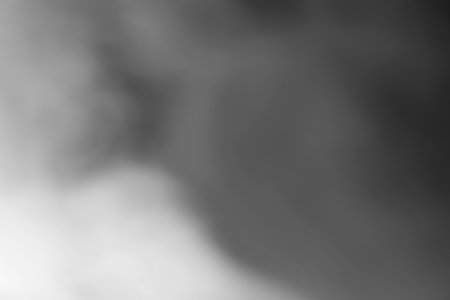 Smoky texture. Foggy background. Abstract foggy surface. Defocused cloud of steam. Blurred image.の写真素材