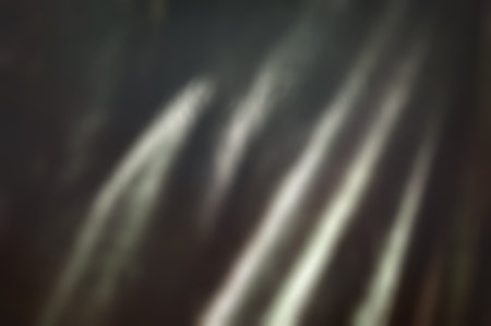 Abstract background. Glaring surface. Light spots. Defocused light. Blurred imageの写真素材