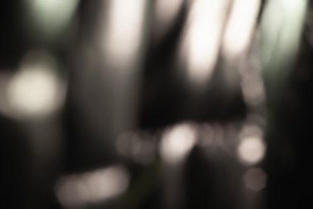 Glare surface. Abstract background. Light stains. Defocused glow. Shiny surface. Blurred imageの写真素材