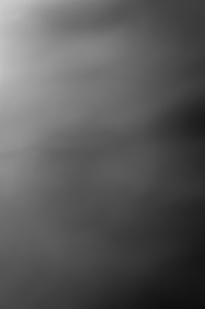 Smoky texture. Foggy background. Abstract hazy surface. Defocused cloud of steam. Blurred imageの写真素材