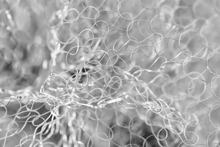 Abstract background. Tangled wire close-up. Blurred texture. Macro image. Selective soft focusの写真素材