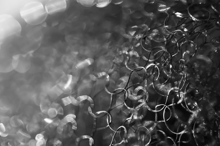 Abstract background. Tangled wire close-up. Blurred glitter texture. Macro image. Soft focusの写真素材