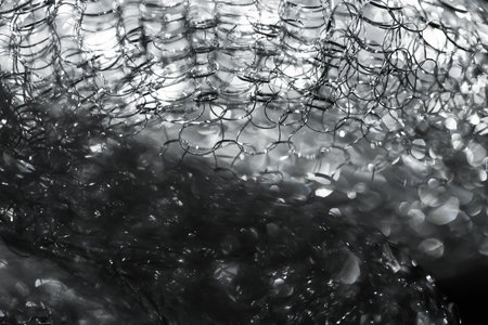 Abstract background. Tangled wire close-up. Blurred glitter texture. Macro picture. Selective soft focusの写真素材