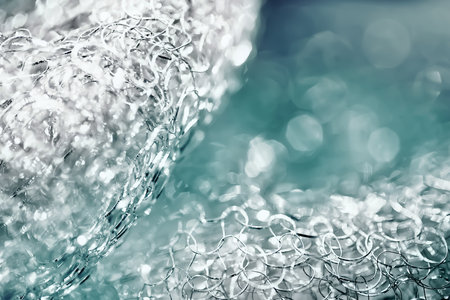 Glare abstract background. Tangled wire close-up. Blurred texture. Macro image. Selective soft focusの写真素材