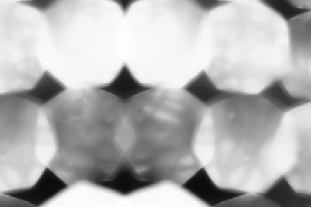 Glare surface. Blurred glitter texture. Abstract background. Defocused macro imageの写真素材