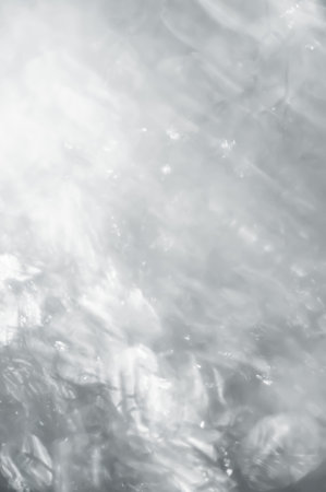 Blurred glitter texture. Abstract background. Glare surface. Out of focus macro imageの写真素材