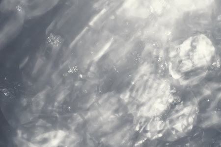 Blurred shiny texture. Abstract background. Glare surface. Out of focus macro imageの写真素材