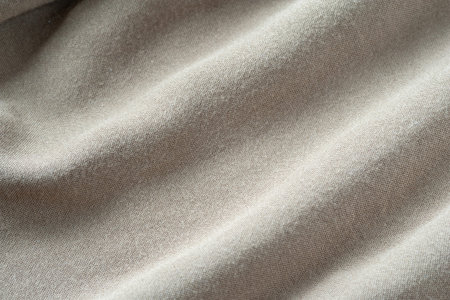 Fabric texture with folds. Natural cotton fabric. Folds in fabric. Detailed background