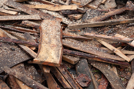 Pile of broken boards at the sawmill. Selective soft focusの写真素材