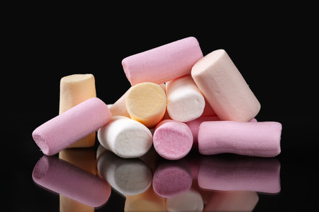 Marshmallow. Pile of marshmallows on a dark backgroundの写真素材