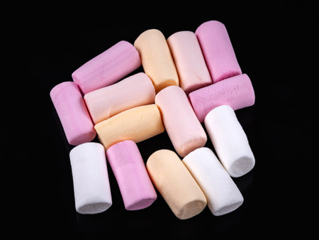 Marshmallow. Heap of colored marshmallows on a dark background. Top viewの写真素材