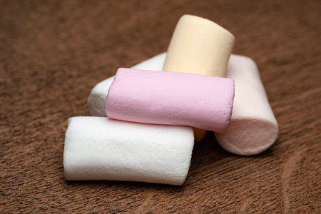 Marshmallow. A pile of marshmallows on a wooden surface. Soft focusの写真素材