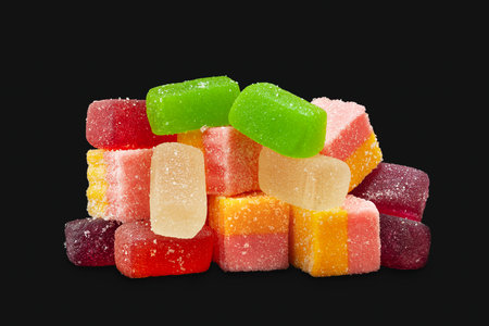 Multicolored marmalade. Jelly sweets on a black background. Sweets for allの写真素材