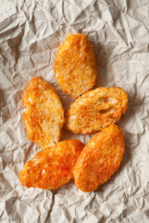 Fried croutons. Croutons on paper. Soft focusの写真素材