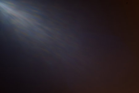 Glare on TV screen. Dark abstract background. Copy spaceの写真素材