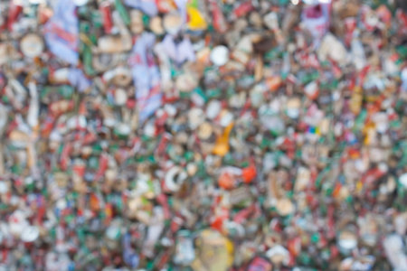 Blur crushed tin cans for recycling