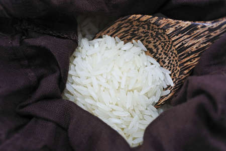 Grain in wooden spoon.の写真素材