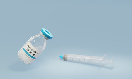 Vials with corona virus vaccine and syringe on light background. Space for text.の写真素材