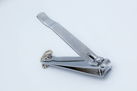Silver nail clippers on the floor.の写真素材