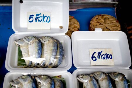 Thai mackerel fish sell for five,one hundred bath and six,one hundred bath.の写真素材