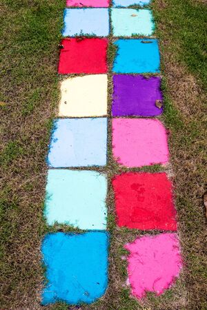 Many colored bricks were laid for walkways on the field.の写真素材