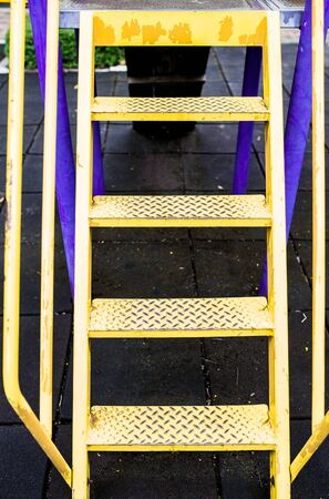 Yellow stairs for amusement in the park.の写真素材