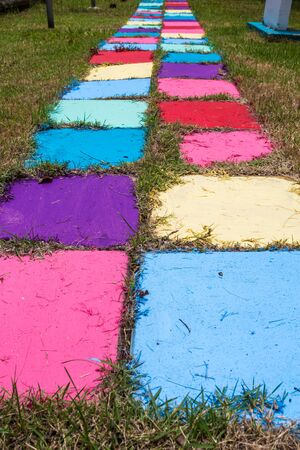 Many colored bricks were laid for walkways on the field.の写真素材