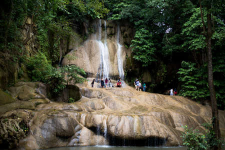 Sai Yok Noi Waterfall, Kanchanaburi, Thailand, July 10 2018.Tourists are enjoying the beauty of Sai Yok Noi waterfall.のeditorial素材