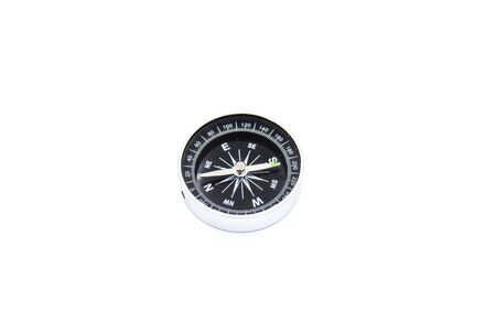 One compass is on a white background.の写真素材