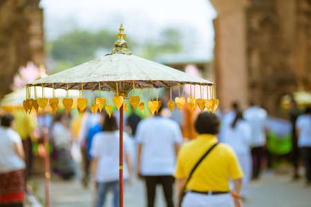 Chiang Rai, Thailand, April 28 2019.Umbrellas decorated with leaves in Kathin ceremony.のeditorial素材