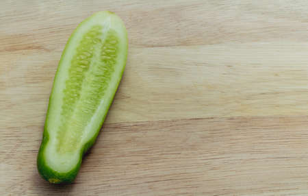 Cucumber sliced on woodの写真素材