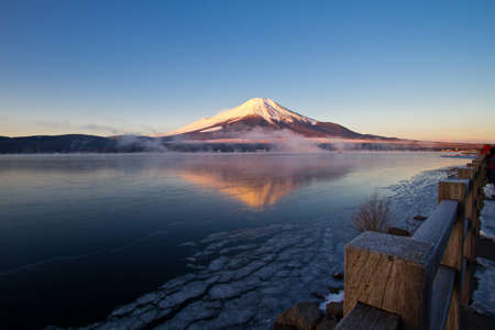 Mount Fuji,Pre-dawn view of Mount Fuji with mirror reflection in lakeの写真素材