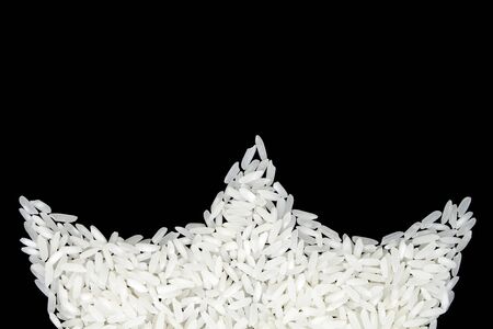 White rice on black backgroundの写真素材