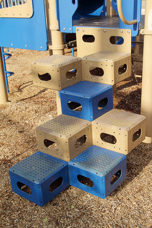 Blue and light brown stairs on children's playground