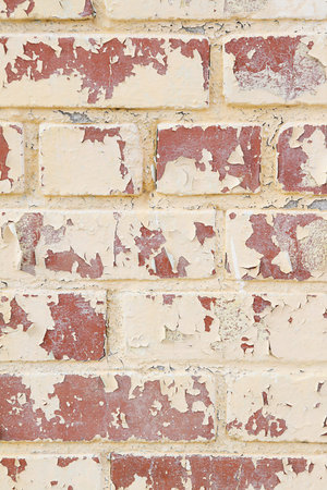 Photo of an old wall with red bricks, good as a backgroundの写真素材