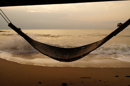 Beach bamboo cradle hanging by the sea ,Thailandの写真素材