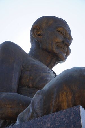 Phra Buddhacharn Toh Phomarangsi, Buddha monk statue in a temple in Ang Thong, Thailandの写真素材