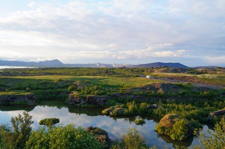 View of Lake Myvatn with various volcanic rock formations,Northeast Icelandの写真素材