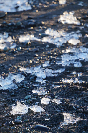 Ice blocks at Diamond beach near Jokulsarlon Glacier Lagoon in summer, Iceland.