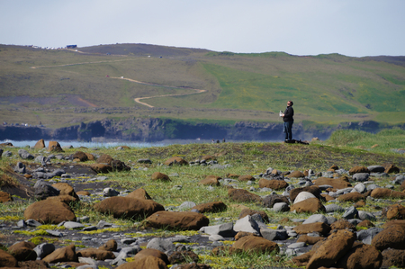 Reynisdrangar beach, Iceland - 4 July 2017: Unidentified tourist controlling drone at Reynisdrangar beach in Icelandlのeditorial素材