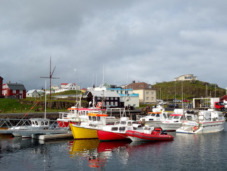 Stykkisholmur,Iceland- 27 June 2017: Unidentified tourists parking at the pier of Stykkisholmur,...