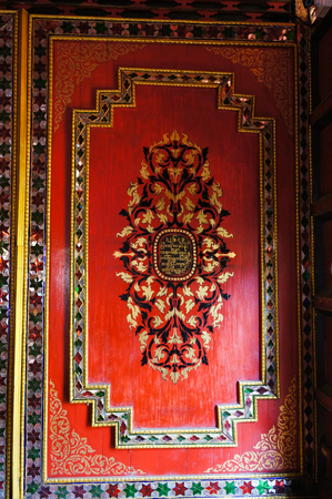 Beautiful wall with Burmese alphabets at Wat Sri Rong Muang, Lampang,Northern Thailand.のeditorial素材