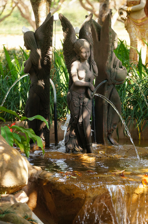 Statues of Thai angel in the garden, North of Thailand.の写真素材