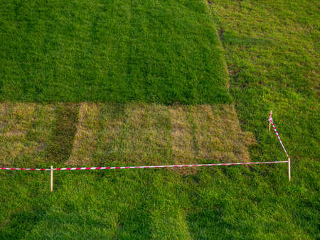 Lawn fenced with tapeの写真素材