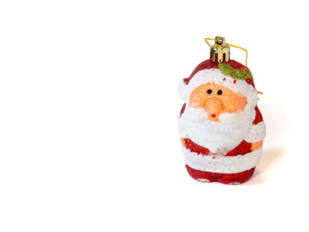 Christmas toy santa claus on a white backgroundの写真素材