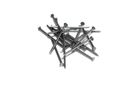 A handful of nails on a white background. Isolate.の写真素材