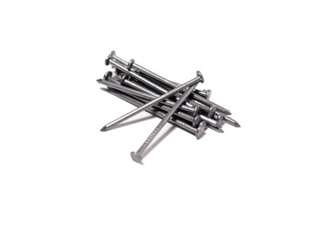 A handful of nails on a white background. Isolate.の写真素材